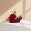 Red waxy rose branch artificial flowers are decorative floral arrangement materials details Picture
